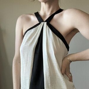 The limited Color block black 🖤 and white 🤍 satin Strappy blouse.